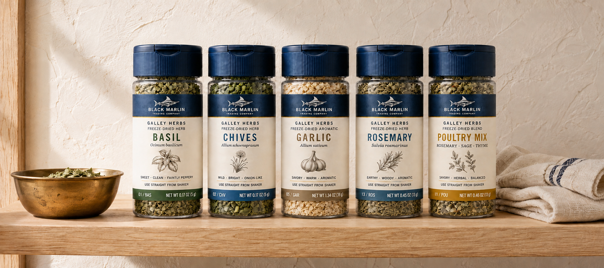Five Galley Herbs shaker jars on a wooden shelf
